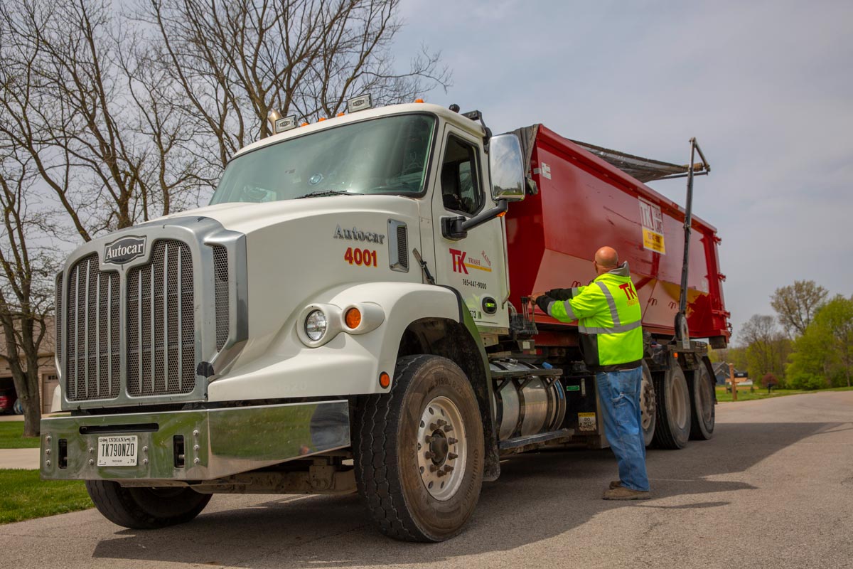 roll off dumpster securing load in Indiana